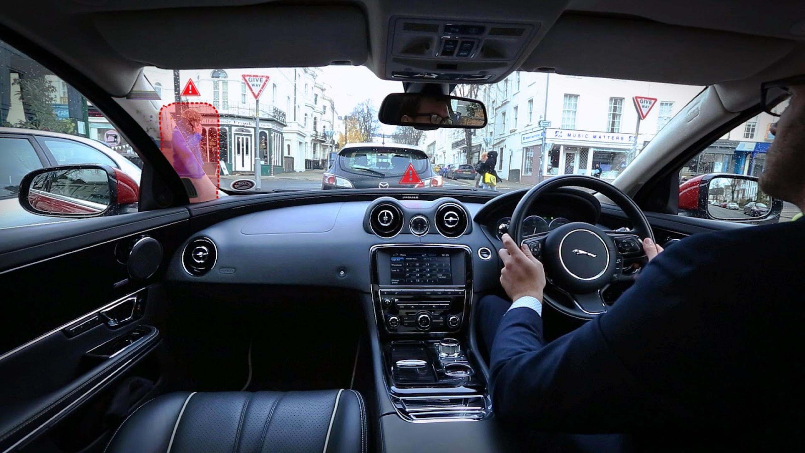 Jaguar Land Rover's new innovation: transparent pillar and 'follow-me' ghost car navigation