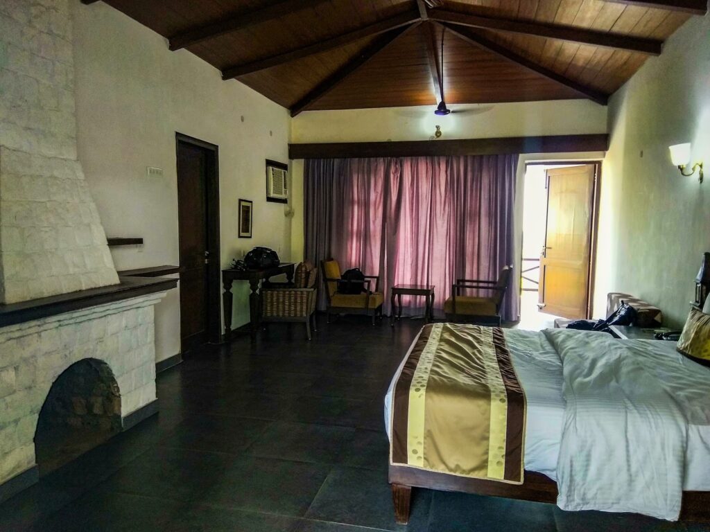 Spacious cottages with fireplace and private balcony at Vanvasa Resort
